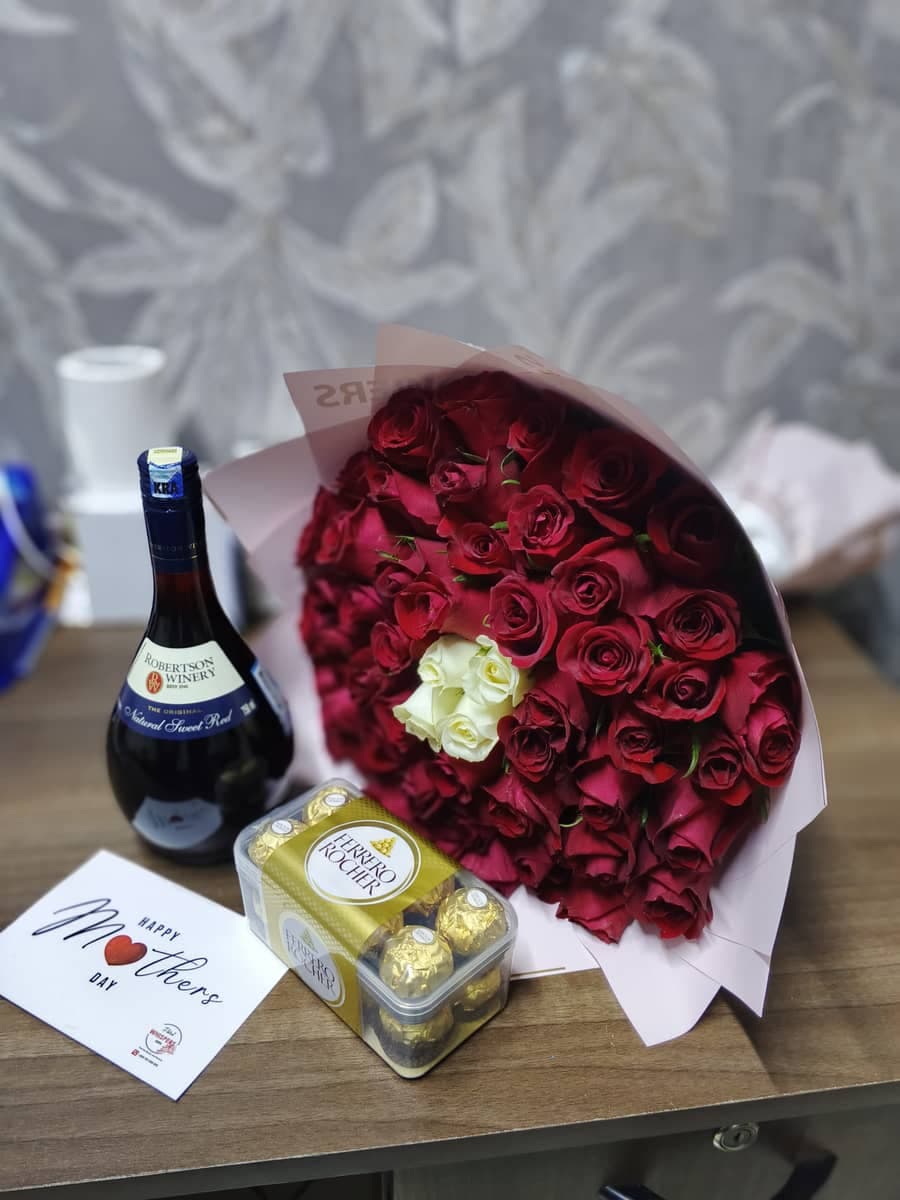 Golden Celebration Gift Hamper – Luxury Flowers, Wine & Ferrero Rocher T16 with Personalized Card - Premium flower delivery Nairobi CBD, Westlands, Karen | Whispers Floral Gifts