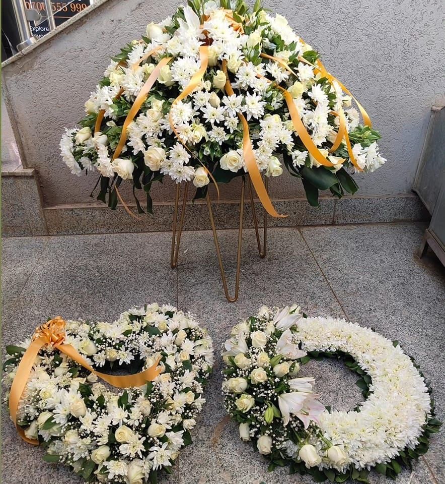 Graceful farewell wreath arrangements — flowers delivered in Nairobi by Floral Whispers Gifts
